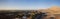 Aerial view over rural farmland and desert