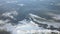 Aerial view over snowy mountains