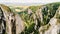 Aerial view over Turda Gorges - Cheile Turzii next to Cluj-Napoca in Romania during a summer day.