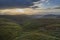Aerial View over Upland Landscape at Stormy Sunrise