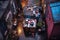 aerial view of overfilled dumpster in an alley