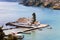 Aerial view of the Panagia Vlacherna church with boats in Corfu, Greece