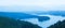 Aerial view panorama of the blue lake in a mountain range