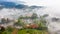 Aerial view of panorama landscape at the hill town in Sapa city, Vietnam with the sunny light and sunset, mountain view in the