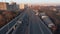 Aerial view panorama of multi-level transport interchange in the center of the big city at dawn