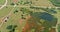 Aerial view panorama of original the historic Route 66 road near oil pump in the countryside across Clinton Oklahoma