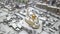 Aerial view of the panorama of the Ukrainian city with a church, in winter during a snowfall