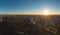 Aerial view panorama of Voronezh city from above at sunset, many buildings in evening cityscape myst, copy space