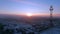 Aerial view panoramic landscape of cell towers at dawn in winter.