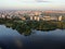 Aerial view panoramic landscape of Moscow city at sunrise. Modern houses in the rays of the golden sun. Drone shot