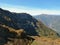 Aerial view panoramic landscape of mountains at sunset on the background of blue sky. Beautiful sunset landscape in the mountains