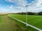 Aerial view on a park with Irish sport training ground for camogie, hurling, rugby, gaelic football, soccer. Tall goal posts.