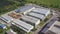 Aerial view of park production plant. Manufacturing area in field drone view. Aerial top down view of modern technology