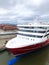 Aerial view of a passengAerial view of a passenger ship in alongside the terminal of port.er ship in alongside the terminal of por