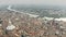 Aerial view of Pavia cityscape involving Cathedral and Ponte Coperto or Coperto Bridge across Ticino River. Lombardy