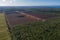 Aerial view of peat harvesting field. Peat extraction