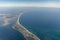 Aerial view of peninsula between Ria Formosa and Atlantic Ocean in Portugal