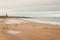 Aerial view of people strolling on beach in North Shields