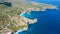 Aerial view of a person along the whole sand beach coastline, Nusa Penida. Bali, Indonesia, July 20, 2023