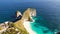 Aerial view of a person along the whole sand beach coastline, Nusa Penida. Bali, Indonesia, July 20, 2023