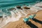 Aerial view of a picturesque beach, turquoise waters, and beachside loungers