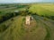 Aerial view of the picturesque Burrow Mump hill and historic site overlooking Southlake Moor