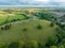 Aerial view of the picturesque Burrow Mump hill and historic site overlooking Southlake Moor