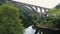 Aerial view picturesque river with roman viaduct