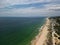 Aerial view of a picturesque view of a tranquil beach in Setubal, Arrabida, Lisbon, Portugal