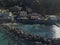 Aerial view of a pier with rocks and house close the sea. Pizzo Calabro. Calabrian coast of Southern Italy. Calabria, Italy