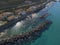 Aerial view of a pier with rocks and house close the sea. Pizzo Calabro. Calabrian coast of Southern Italy. Calabria, Italy