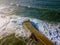 Aerial view of a pier with rocks. Pizzo Calabro pier, panoramic view from above. Broken pier, force of the sea. Power of Waves. N