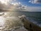 Aerial view of a pier with rocks. Pizzo Calabro pier, panoramic view from above. Broken pier, force of the sea. Power of Waves. N