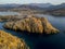 Aerial view of the Pietra Lighthouse and the Genoese tower at sunset. Red Island, Corsica, France