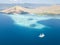 Aerial View of Pinisi Ship, Reef, and Island in Indonesia