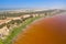 Aerial view of the pink Lake Retba or Lac Rose in Senegal. Photo made by drone from above. Africa Natural Landscape