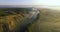 Aerial view of pink sunrise on misty valley