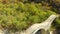 Aerial view of Plakidas arched stone bridge of Zagori region in Northern Greece