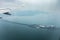 Aerial view from plane window of hong kong - juhai - macau bridge crossing ocean harbor