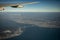 Aerial view from plane window over Akashi-Kaikyo Bridge crossing osaka bay japan