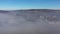 Aerial view of polluted industrial urban area. View of smog from a flying drone