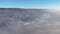 Aerial view of polluted industrial urban area. View of smog from a flying drone