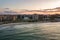 Aerial view of Pomorie city that is located on Black Sea shore. Top view of sand beaches with many hotel buildings and tourist