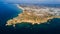 Aerial view of Ponta da Piedade of Lagos, Portugal. Beauty landscape of rugged seaside cliffs and aqua ocean waters in the Algarve