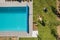 Aerial View of a Poolside and Grass Turfs Installation