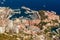 Aerial view of port Hercules of Monaco at sunset, Monte-Carlo, huge cruise ship is moored in marina, view of city life