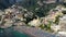 Aerial view of Positano with comfortable beach and blue sea on Amalfi Coast in Campania, Italy. Positano village on the Amalfi