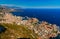 Aerial view of principality of Monaco at sunset, Monte-Carlo, luxury buildings, soccer stadium, view of city life from