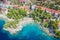 Aerial view of Punta Rata beach with boats and azure sea in Brela, Croatia, Dalmatia, Croatian azure coast