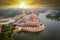 Aerial View Of Putra Mosque with Putrajaya City Centre with Lake at sunset in Putrajaya, Malaysia